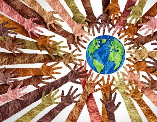 Artistic graphic of racially and culturally diverse hands surrounding the Earth