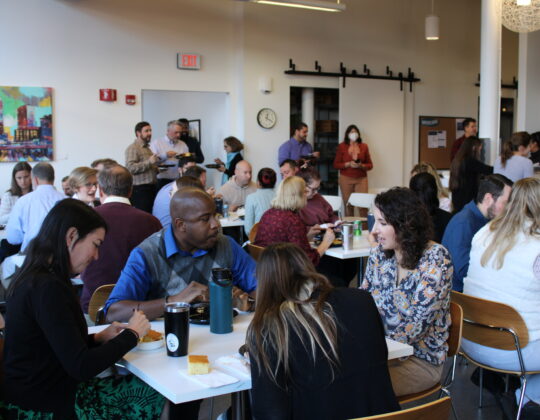 Epsilon employees enjoying a company lunch session.